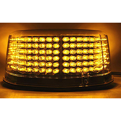 Magnetic amber flashing strobe vehicle beacon with light on.